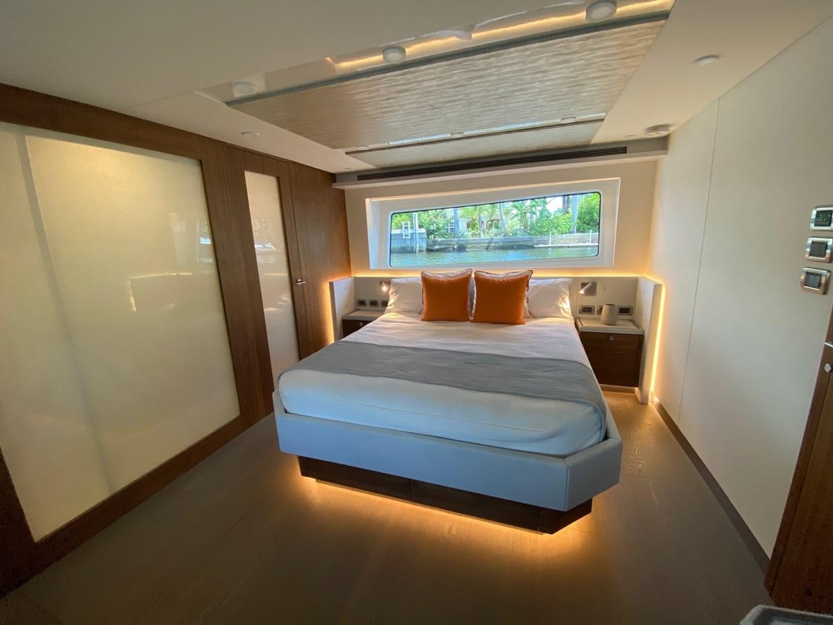 a bed in a room aboard CLB72 Yacht for Sale