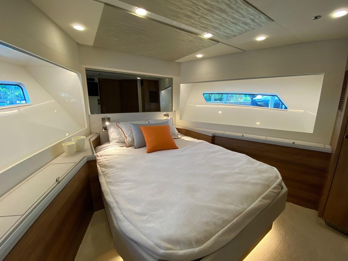 a bed in a room aboard CLB72 Yacht for Sale