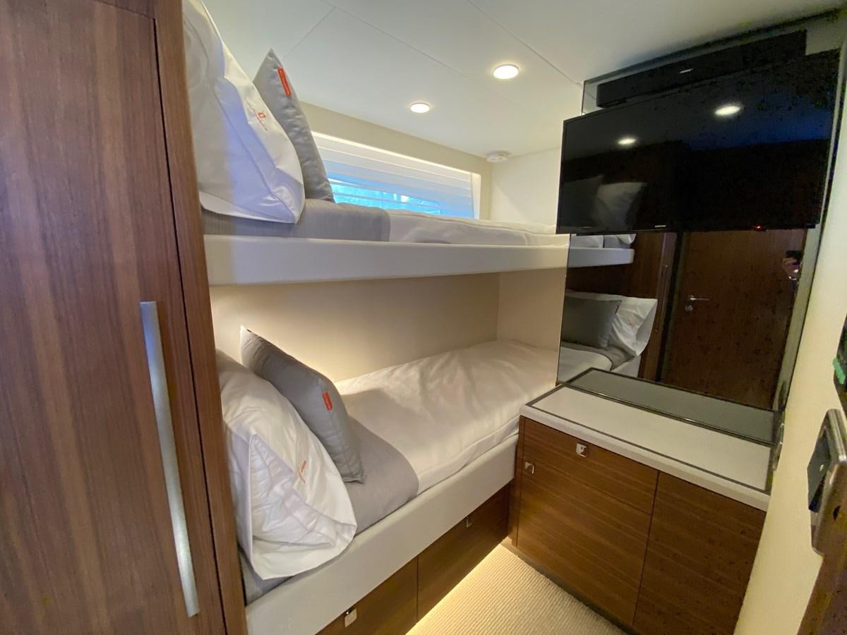 a bed in a room aboard CLB72 Yacht for Sale