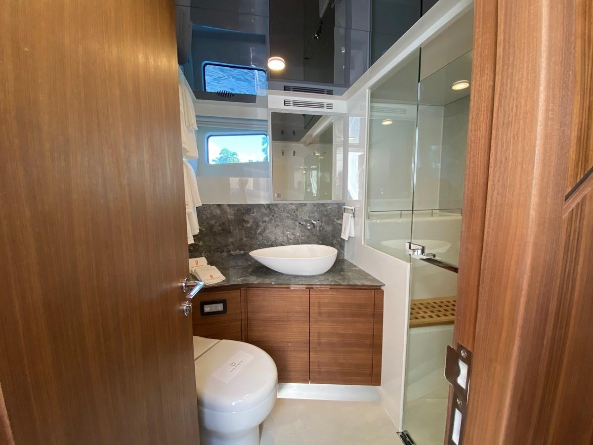 a bathroom with a sink and a toilet aboard CLB72 Yacht for Sale