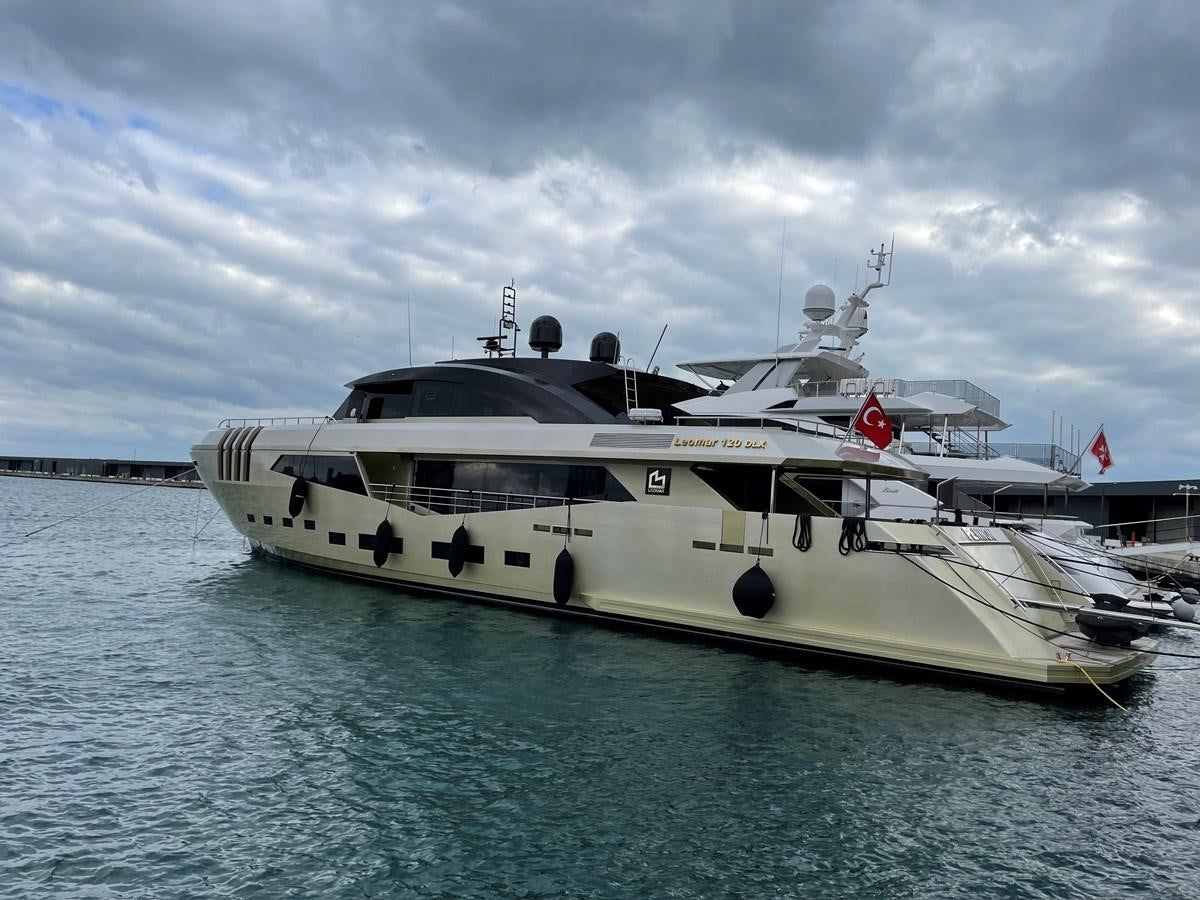 a white yacht in the water aboard AQUILA Yacht for Sale