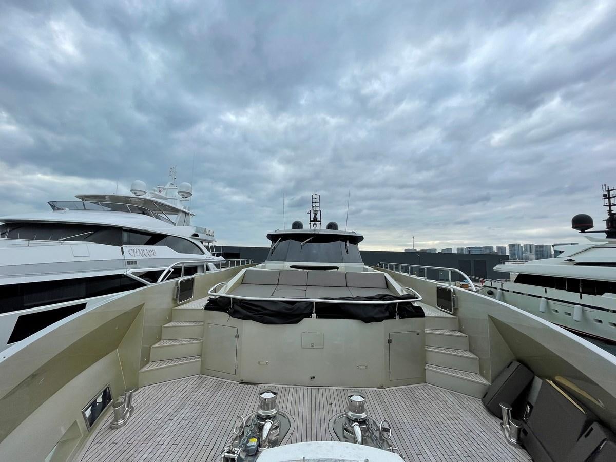 a boat docked at a pier aboard AQUILA Yacht for Sale