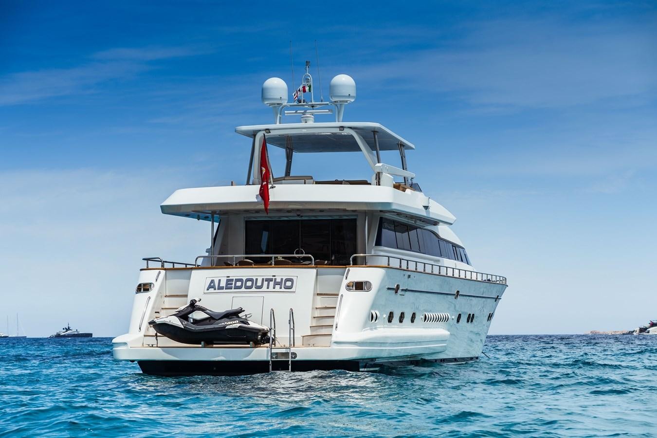 a white boat in the water aboard ALEDOUTHO Yacht for Sale