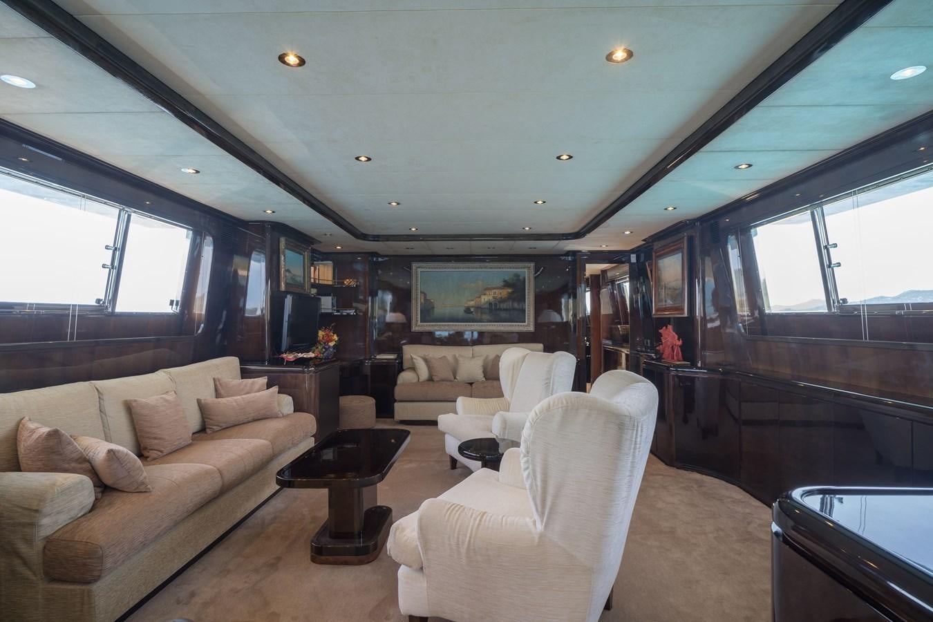 a living room with a couch and a television aboard ALEDOUTHO Yacht for Sale