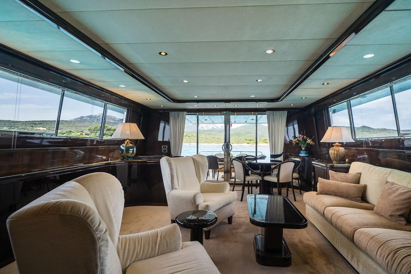a living room with a large window aboard ALEDOUTHO Yacht for Sale