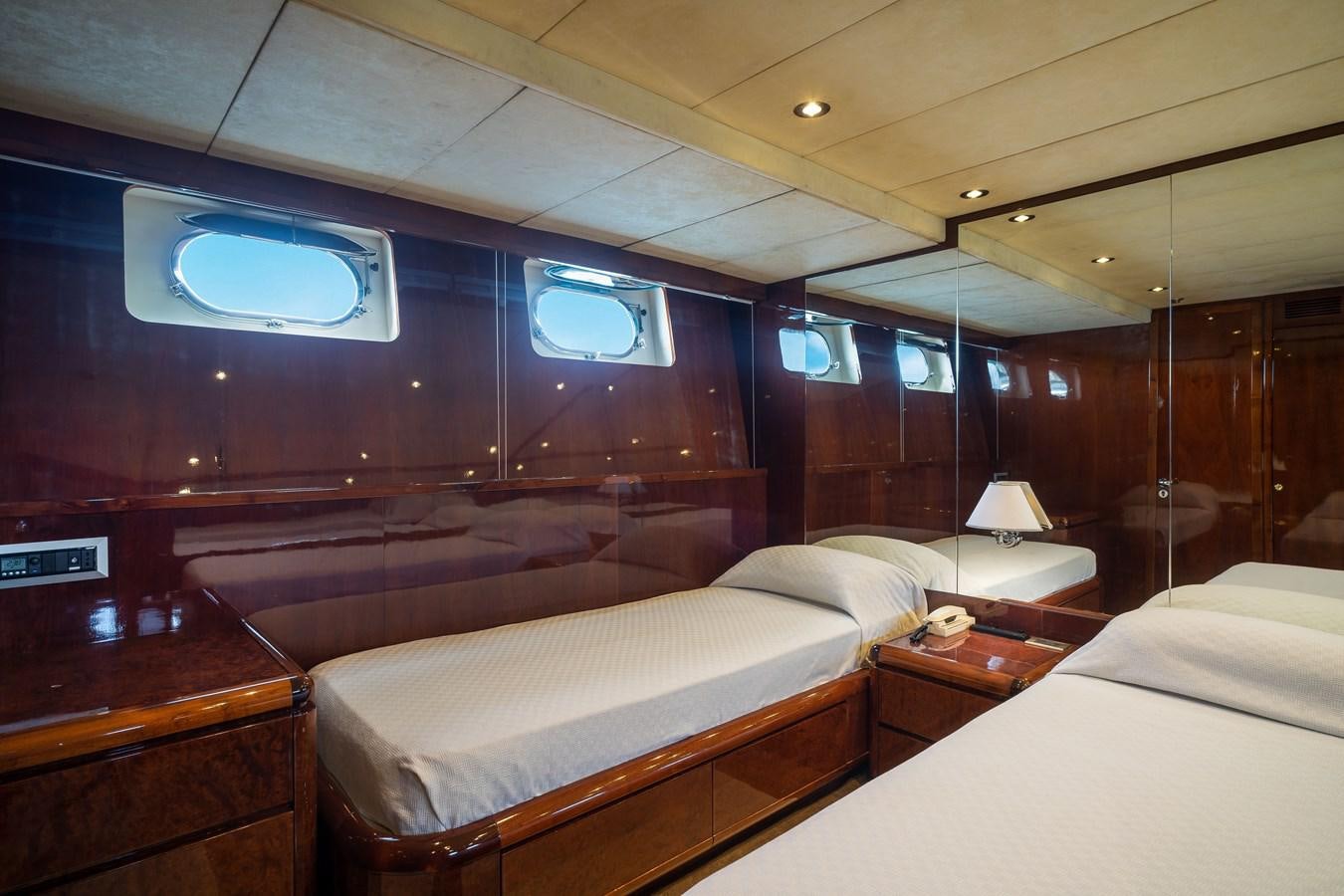 a room with beds and a tv aboard ALEDOUTHO Yacht for Sale