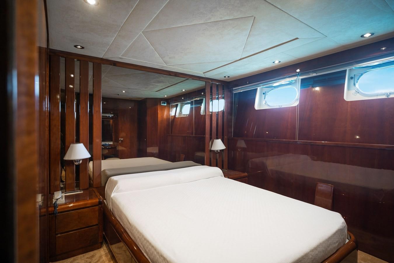 a room with two beds aboard ALEDOUTHO Yacht for Sale