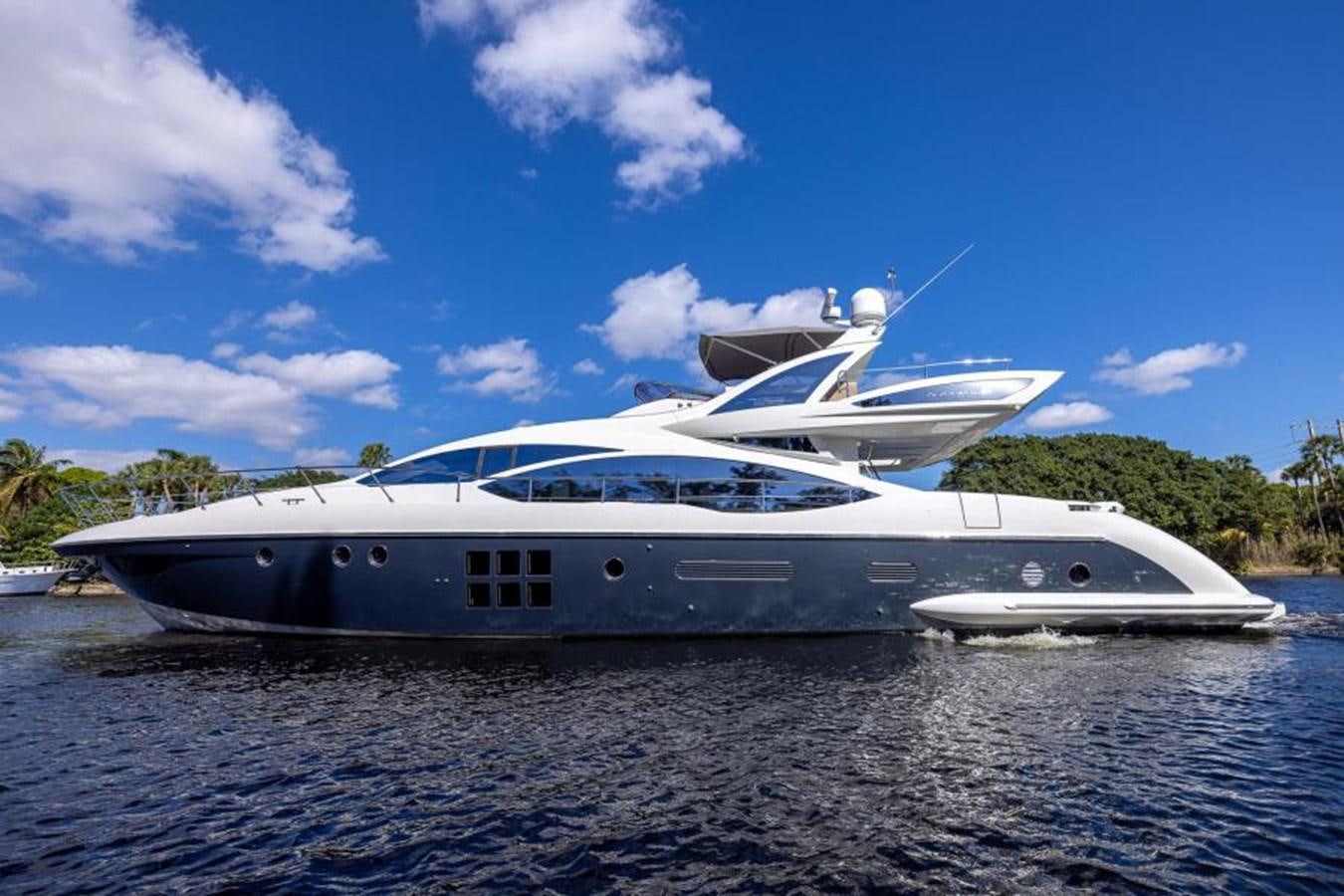a couple of yachts on the water aboard MEANT TO BE Yacht for Sale