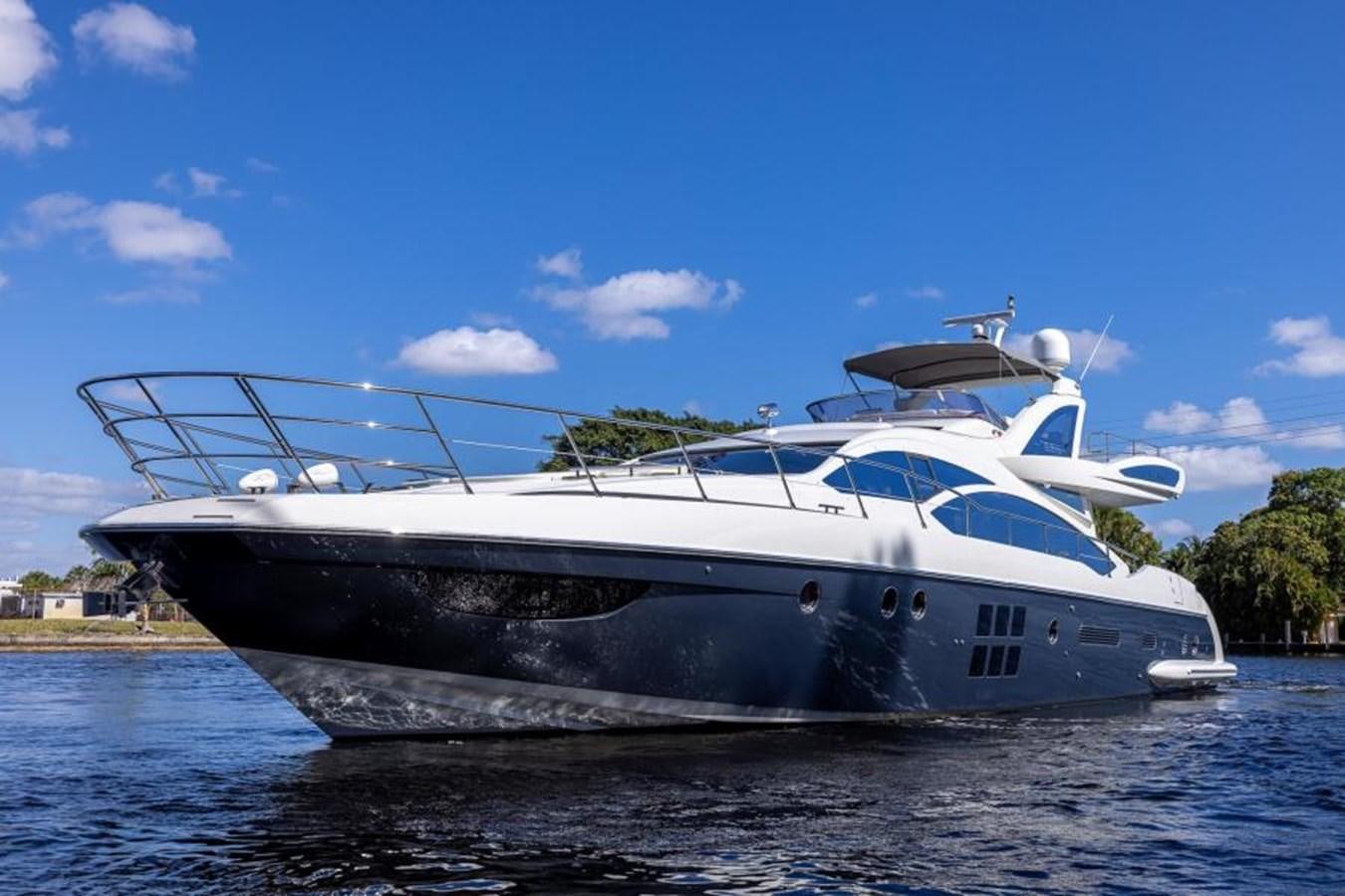 a white yacht on the water aboard MEANT TO BE Yacht for Sale