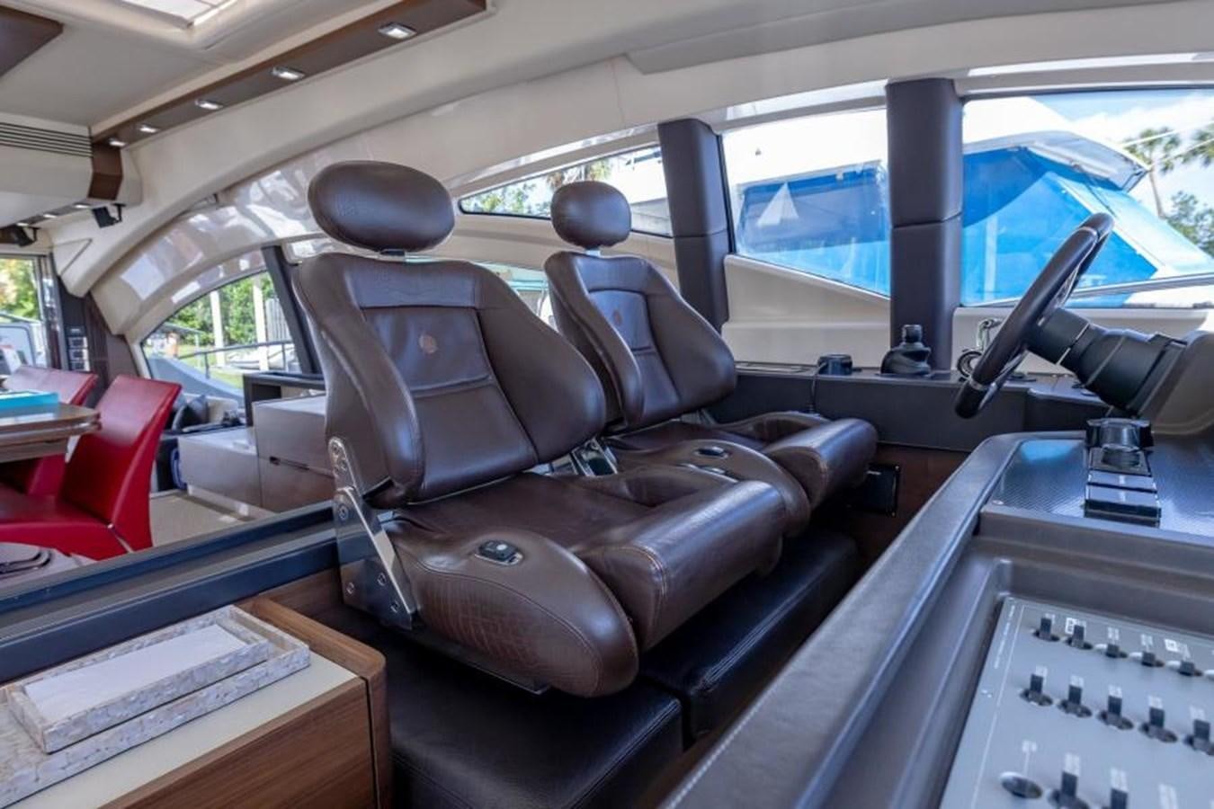 inside of a car aboard MEANT TO BE Yacht for Sale