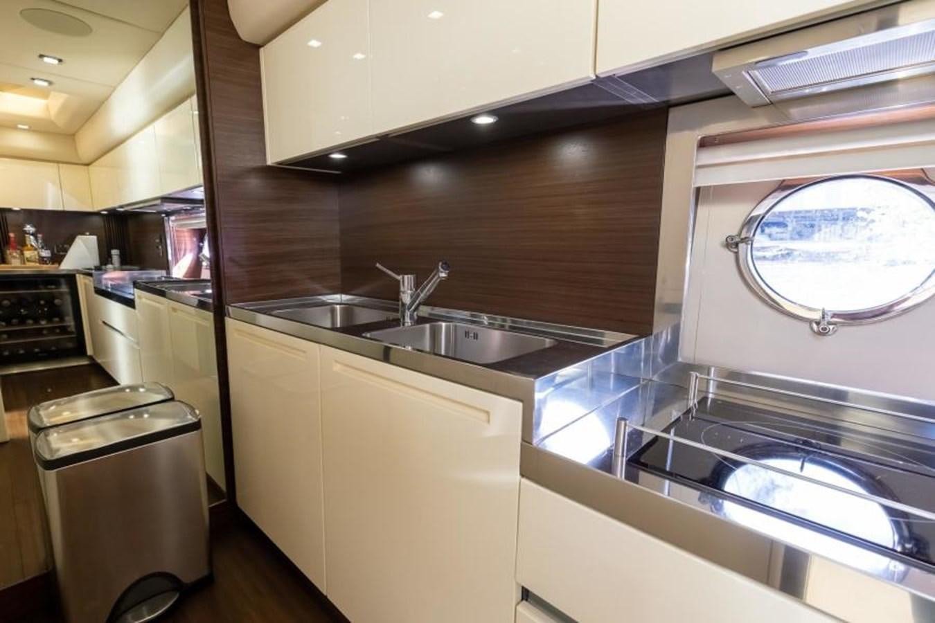 a kitchen with a stainless steel sink aboard MEANT TO BE Yacht for Sale
