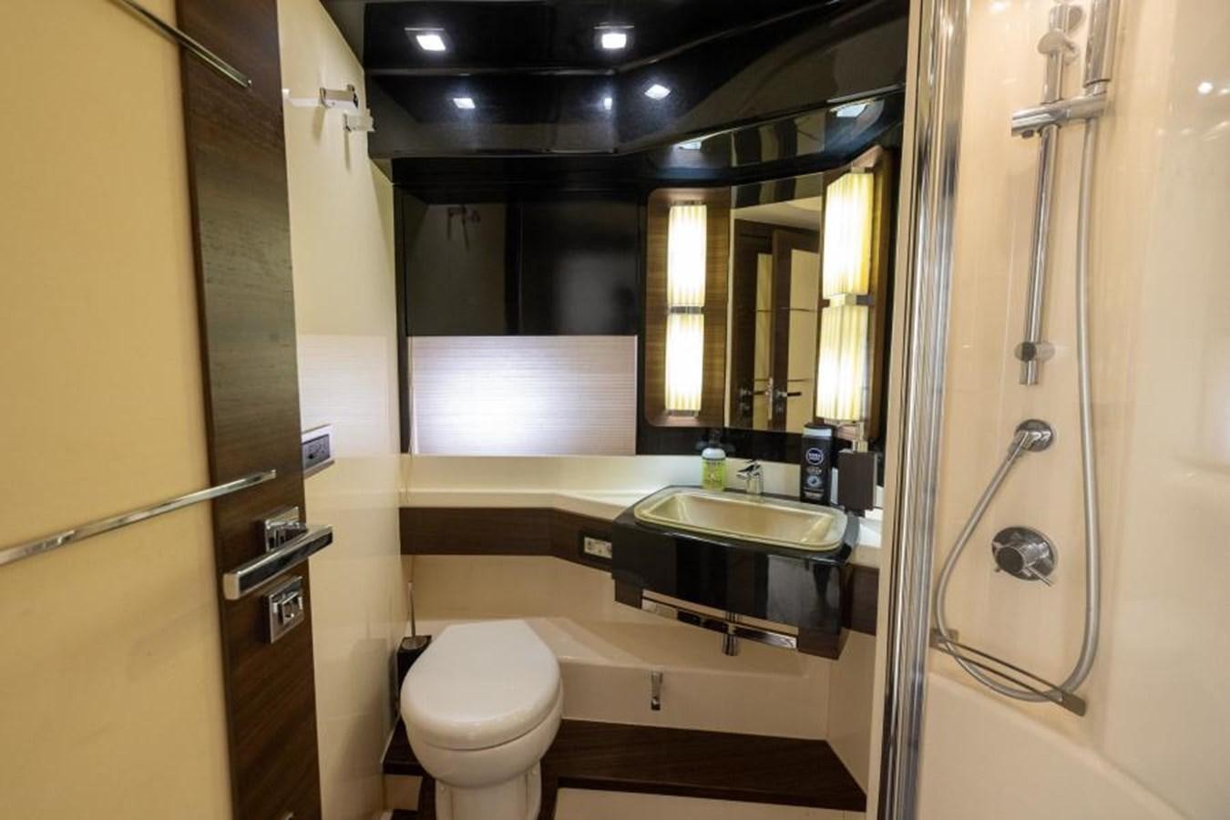 a bathroom with a sink and a toilet aboard MEANT TO BE Yacht for Sale