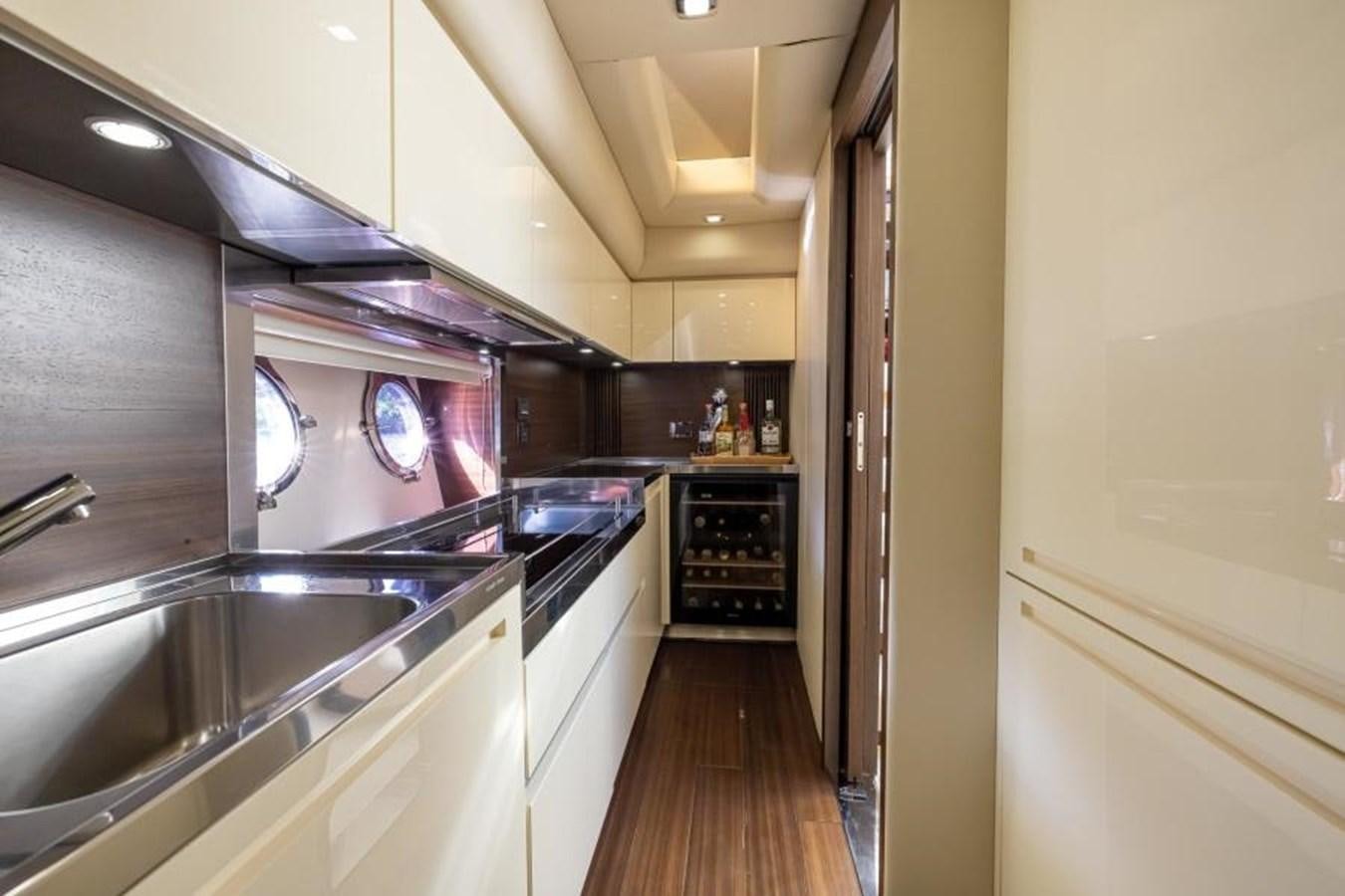 a kitchen with a sink and stove aboard MEANT TO BE Yacht for Sale