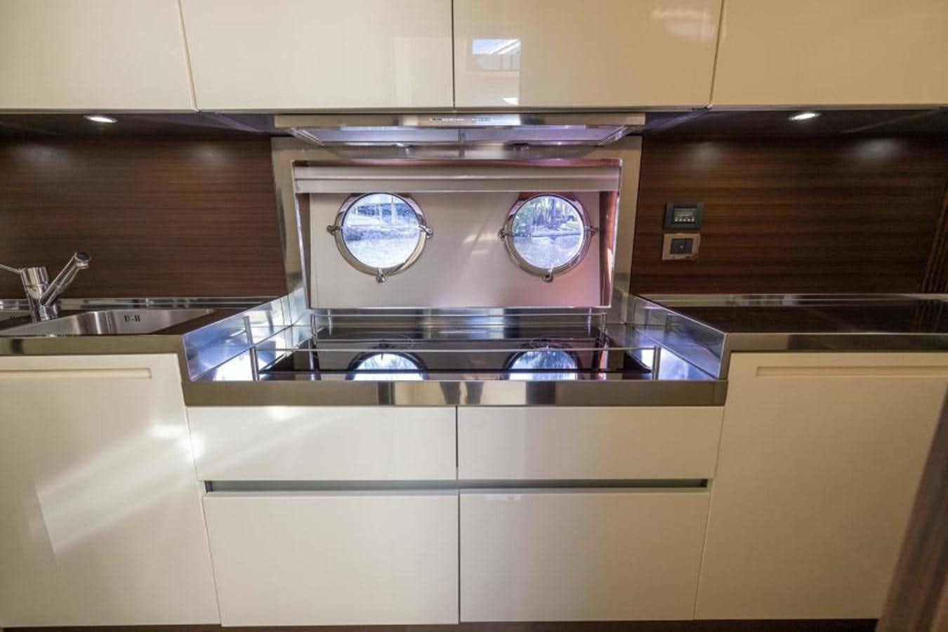 a stove with a large round top aboard MEANT TO BE Yacht for Sale