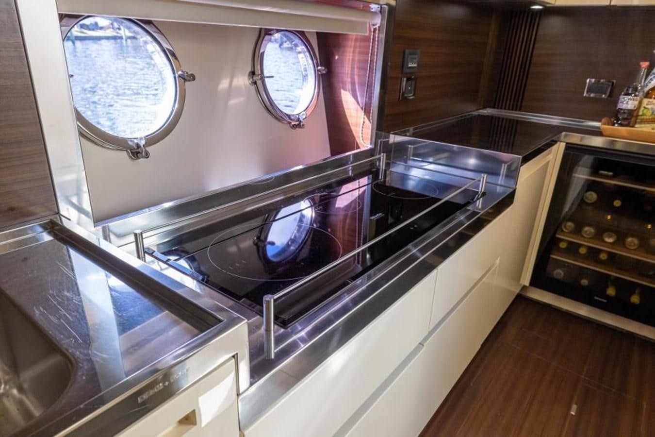a kitchen with a large stove aboard MEANT TO BE Yacht for Sale