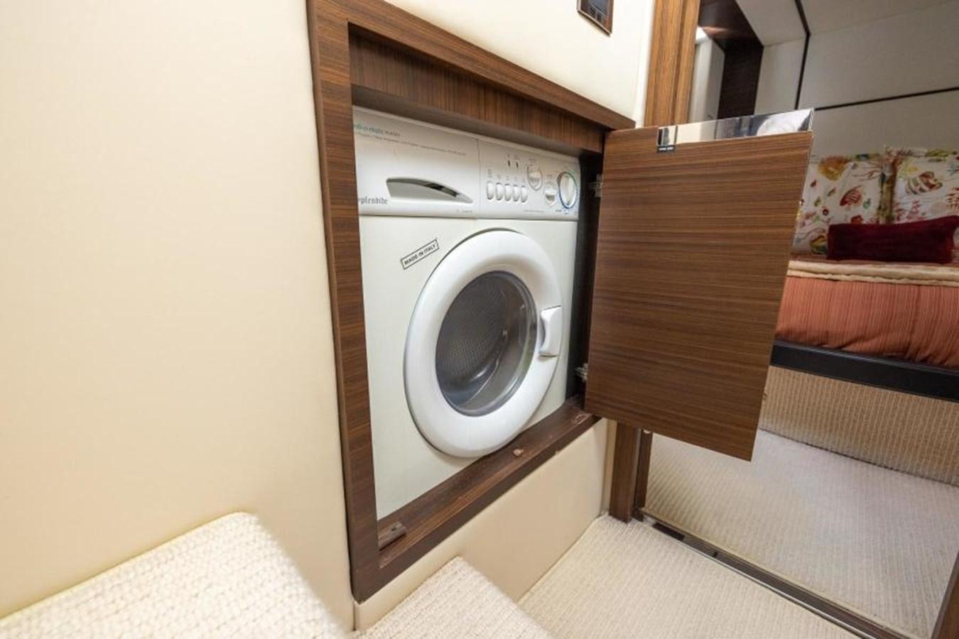 a washing machine in a room aboard MEANT TO BE Yacht for Sale