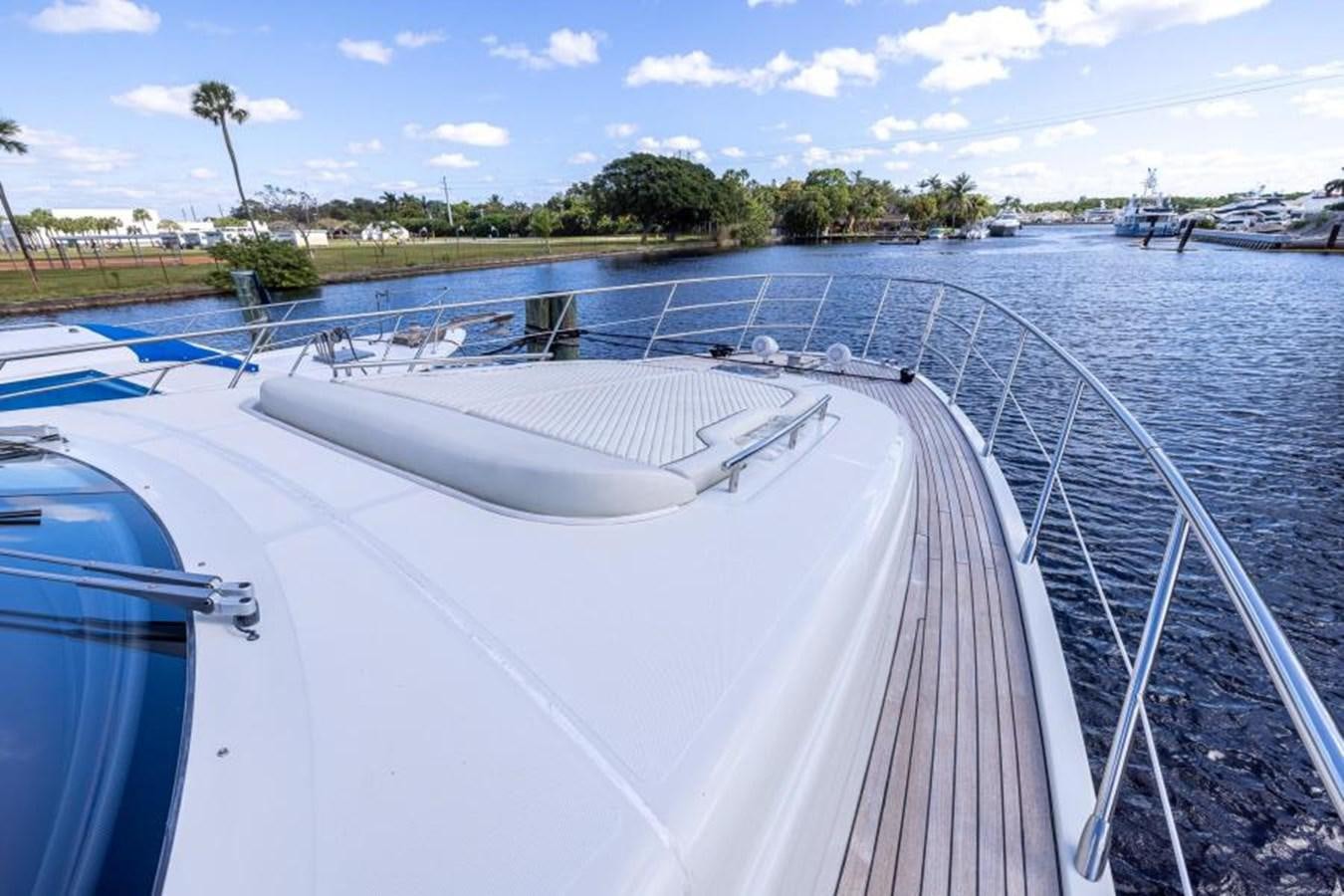 a boat on a river aboard MEANT TO BE Yacht for Sale