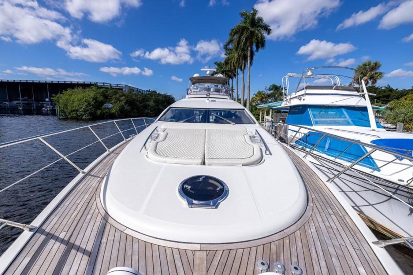 a white boat on a deck aboard MEANT TO BE Yacht for Sale
