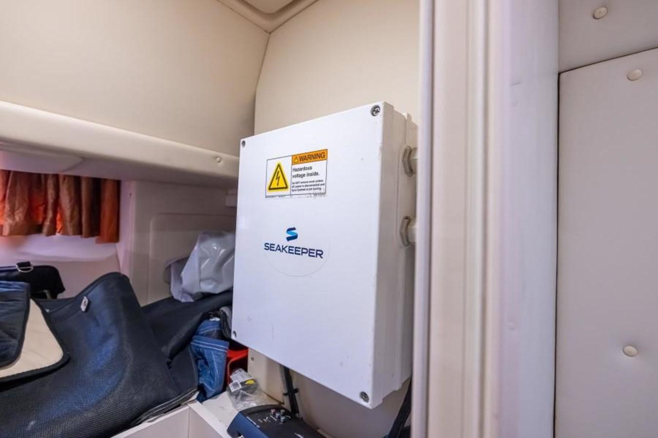 a white refrigerator in a room aboard MEANT TO BE Yacht for Sale