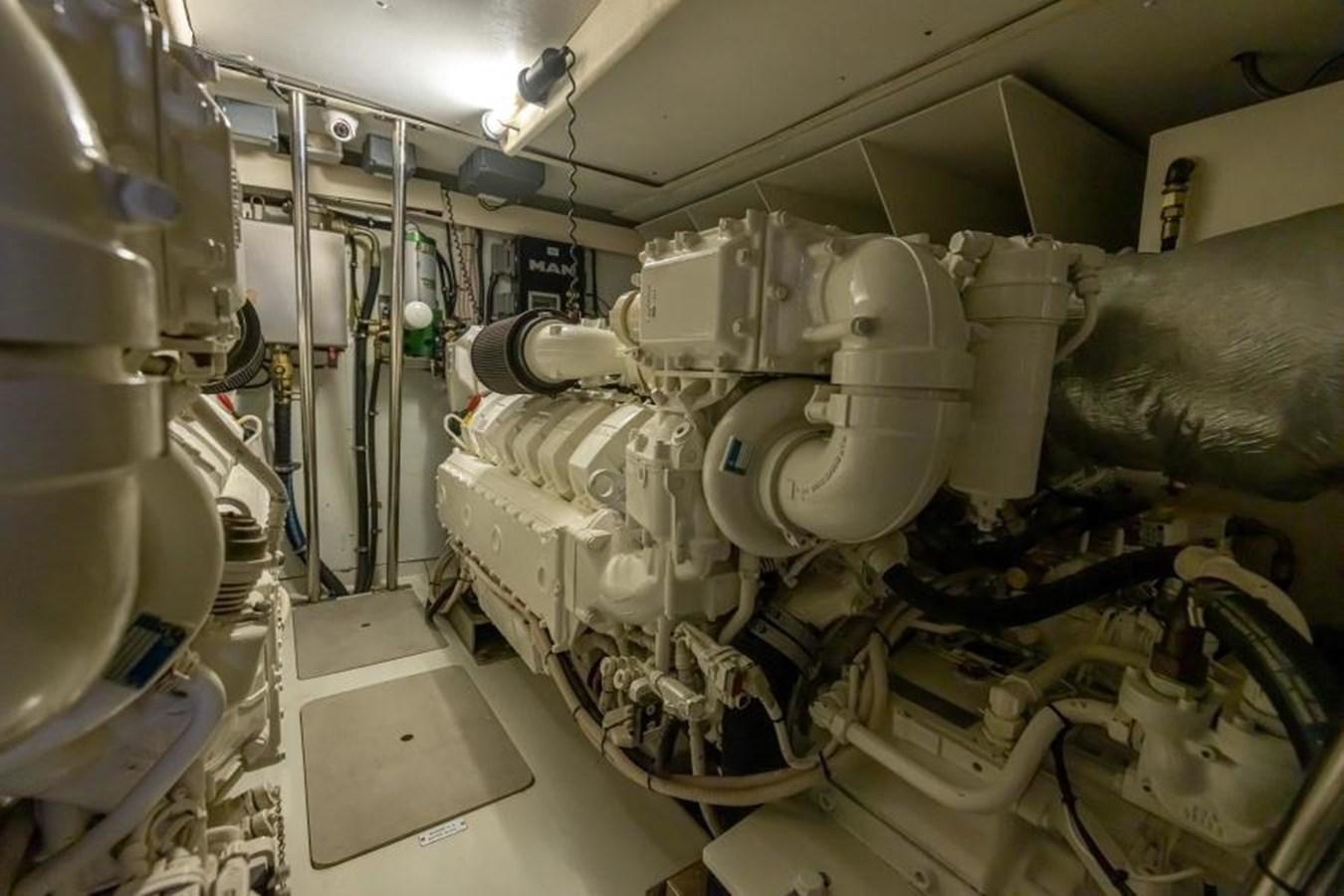 a room with pipes and machinery aboard MEANT TO BE Yacht for Sale
