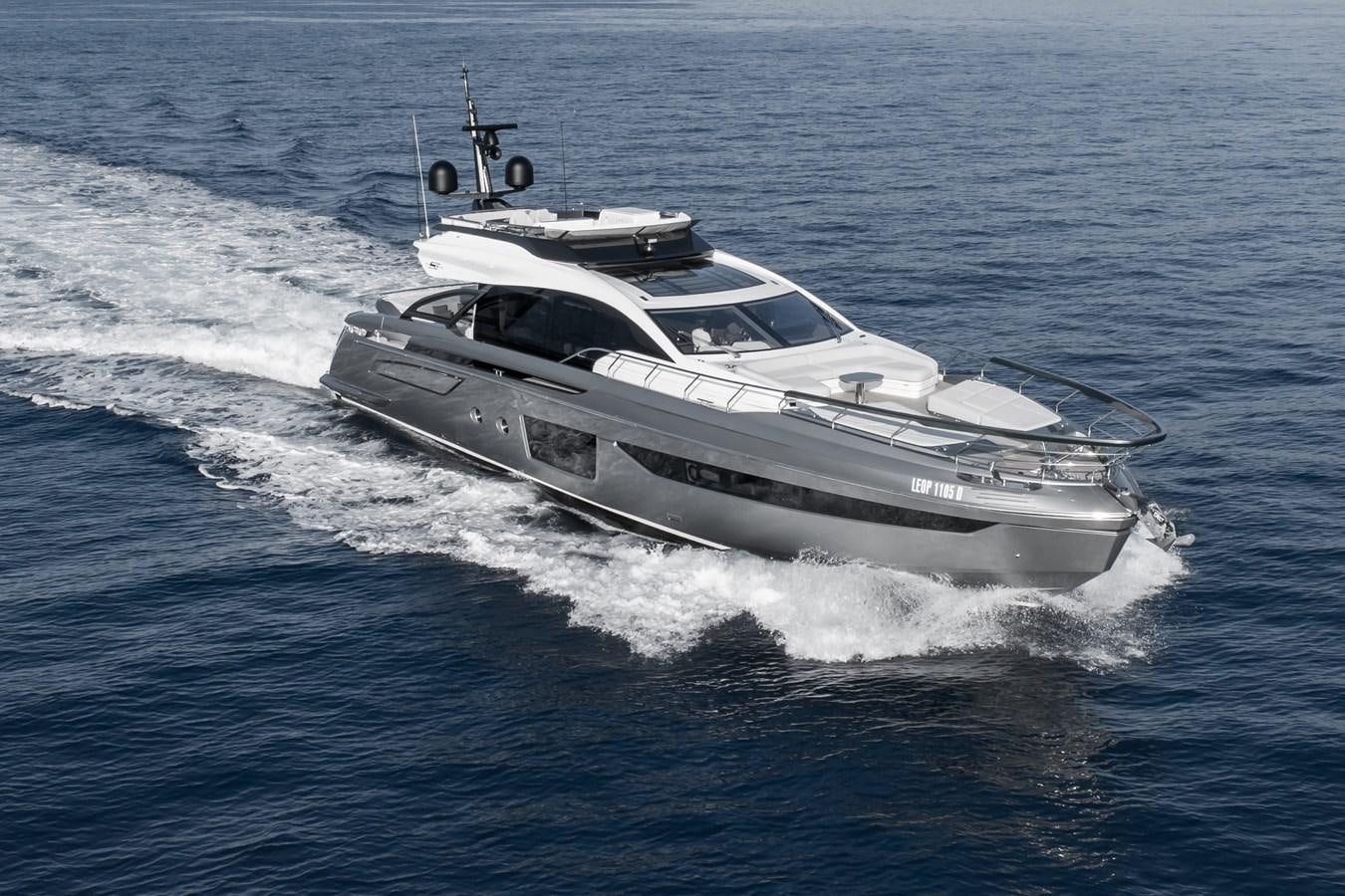 a white yacht in the water aboard NEVER GIVE UP Yacht for Sale