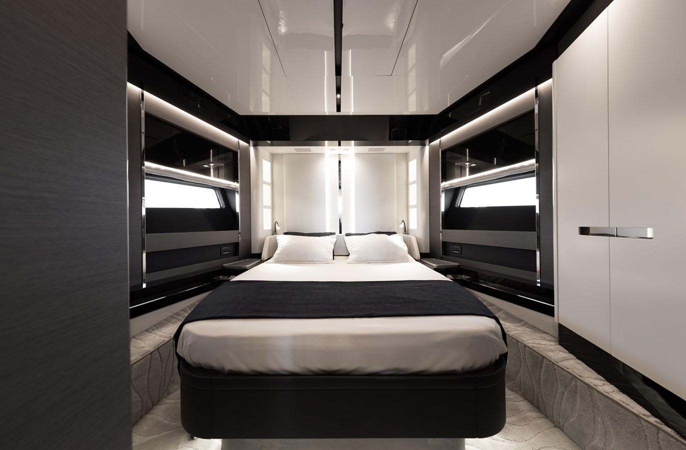 a bedroom with a bed aboard NEVER GIVE UP Yacht for Sale
