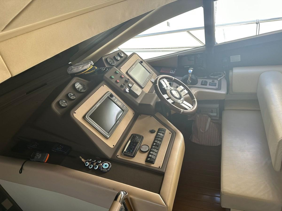 a car with a screen and buttons aboard AZIMUT 64 FLY 2014 Yacht for Sale