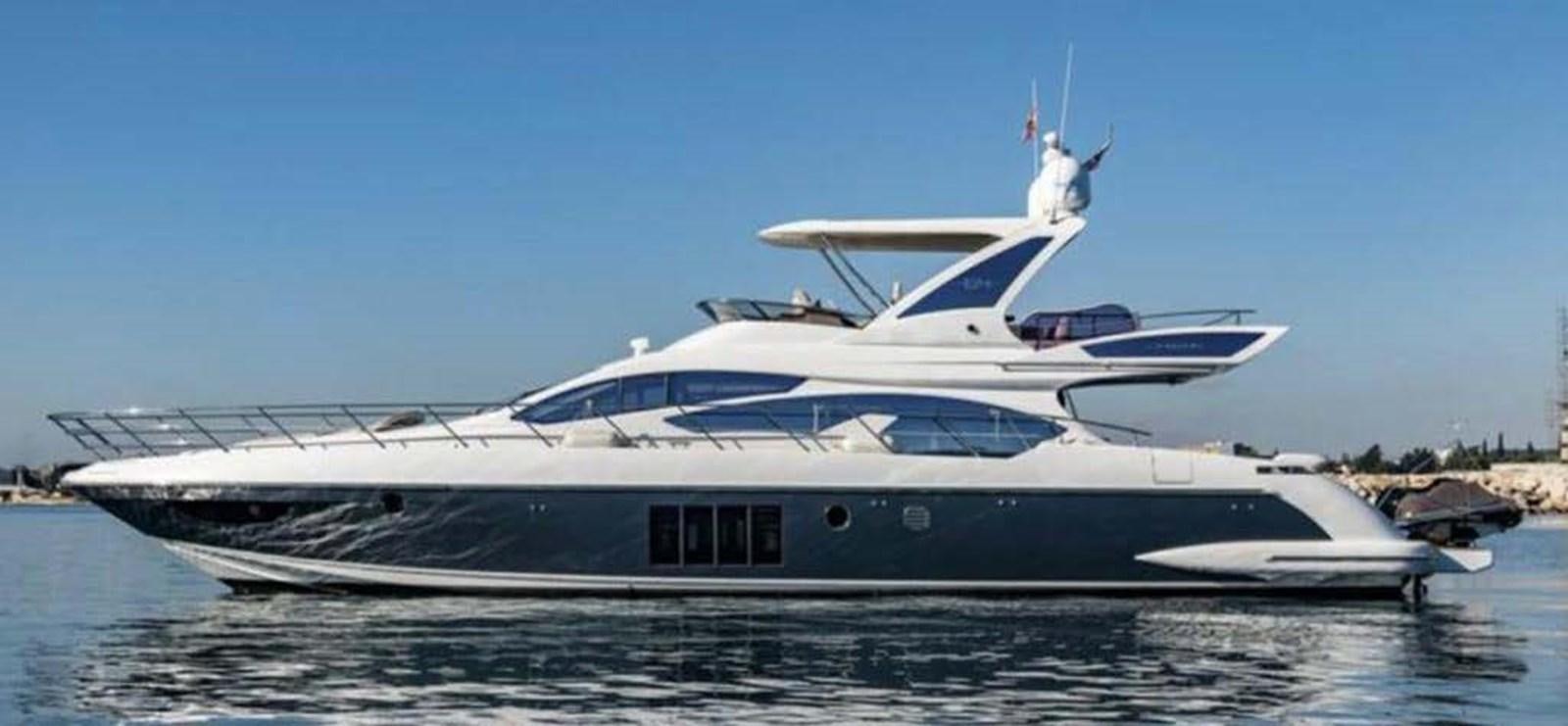 a white yacht on the water aboard AZIMUT 64 FLY 2014 Yacht for Sale