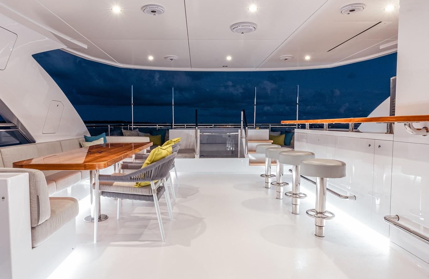 a room with tables and chairs aboard ROMEO FOXTROT Yacht for Sale