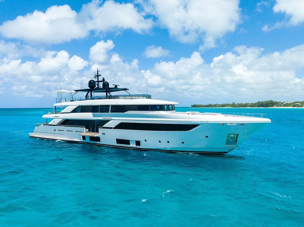 a white yacht in the water aboard ASANTE Yacht for Sale