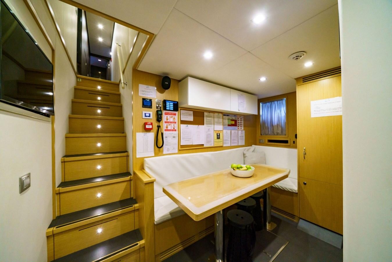 a kitchen with a table and cabinets aboard ASANTE Yacht for Sale
