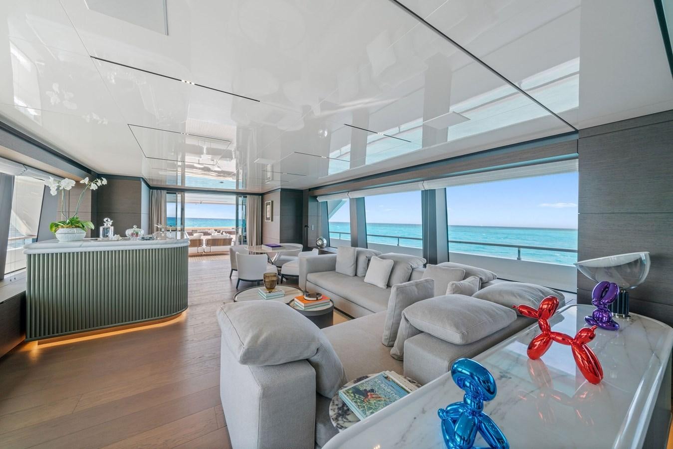 a living room with a large window aboard ASANTE Yacht for Sale