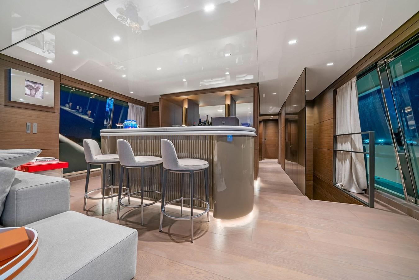 a room with tables and chairs aboard ASANTE Yacht for Sale