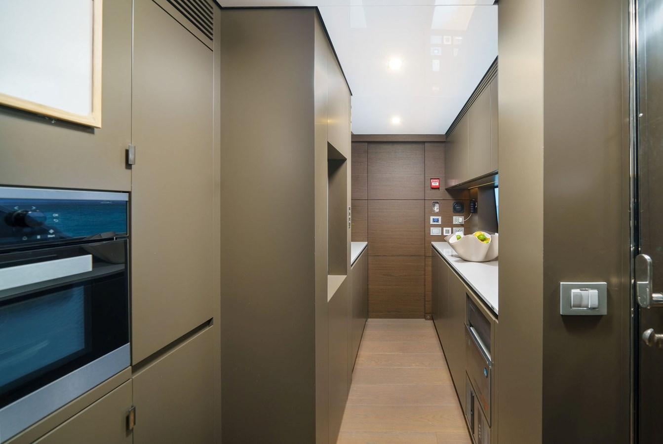 a kitchen with a large shower unit aboard ASANTE Yacht for Sale