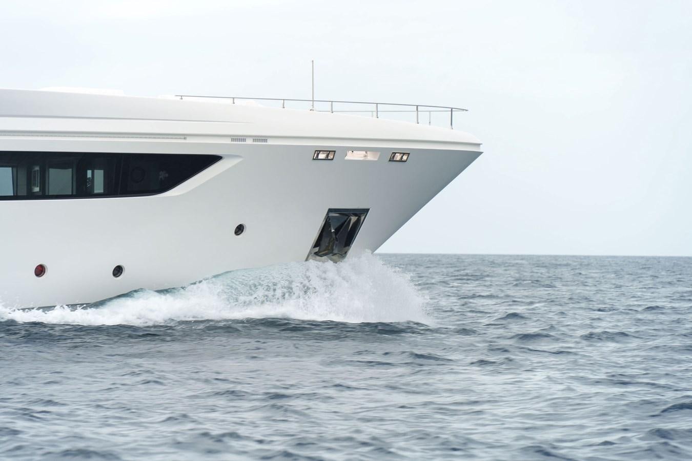 a white boat in the water aboard ASANTE Yacht for Sale