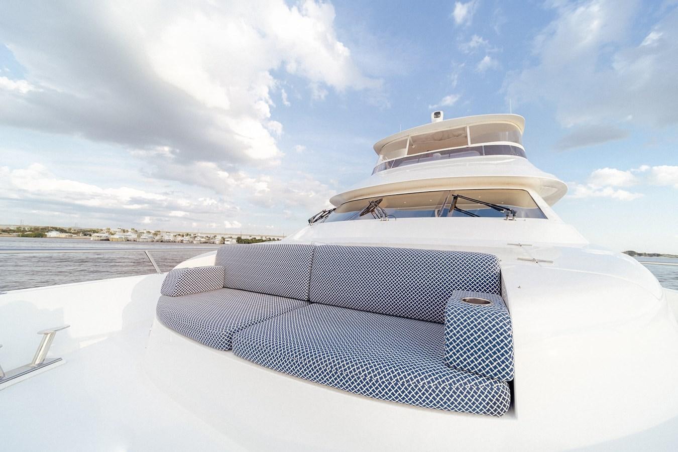 a boat on a beach aboard DARK HORSE Yacht for Sale
