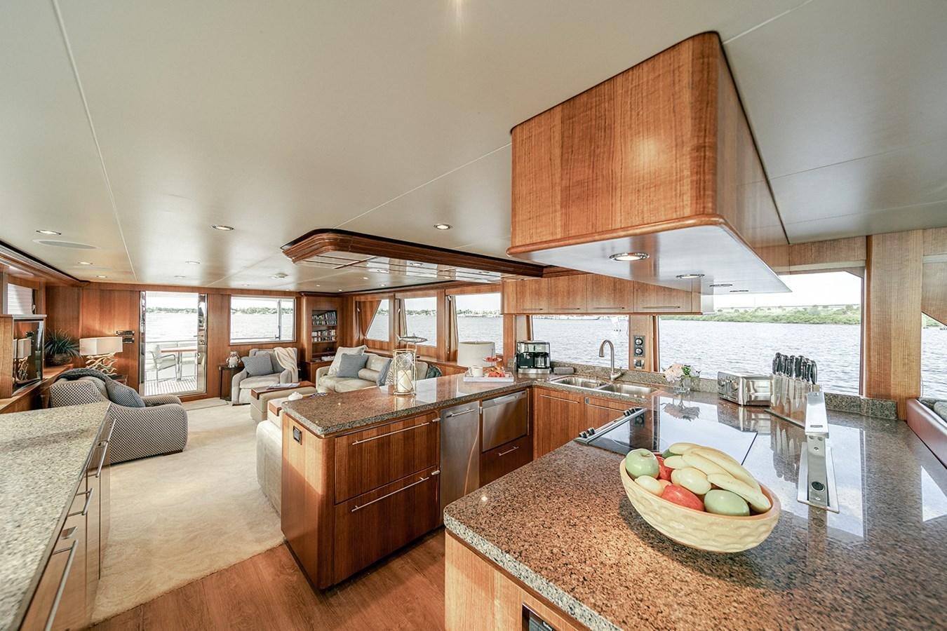 a large kitchen with a large island aboard DARK HORSE Yacht for Sale