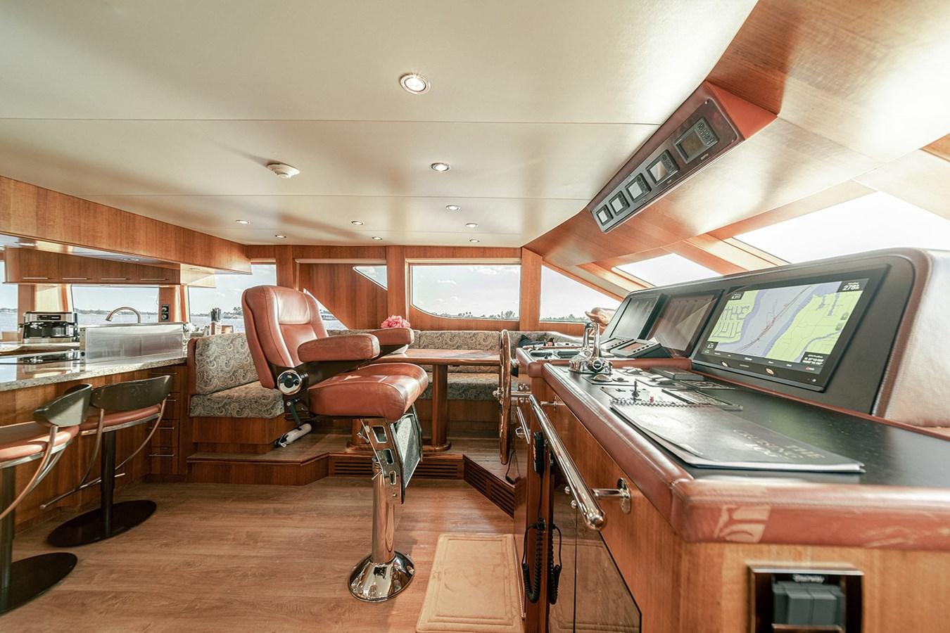 a room with a piano and a piano aboard DARK HORSE Yacht for Sale