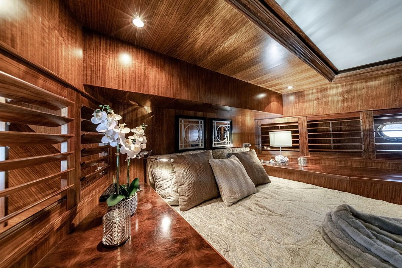 a living room with a wood floor aboard DARK HORSE Yacht for Sale
