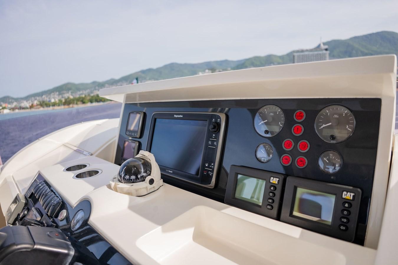 the dashboard of a car aboard PICHOS III Yacht for Sale