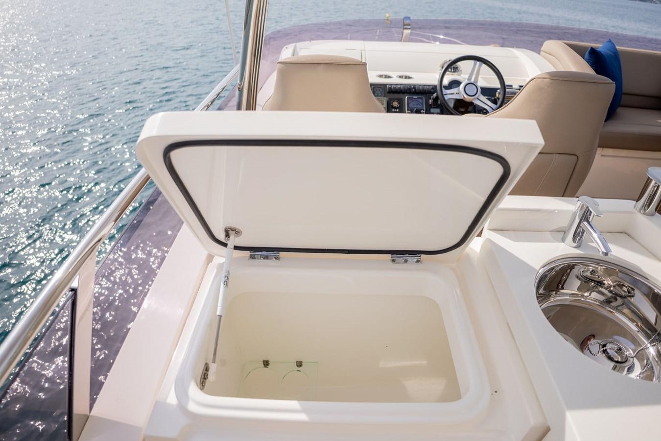 a boat with a steering wheel aboard PICHOS III Yacht for Sale