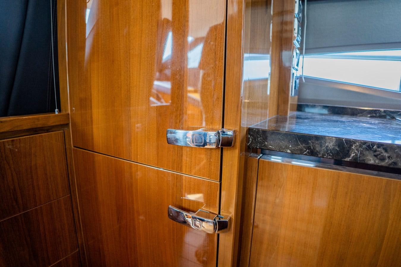 a door with a handle aboard PICHOS III Yacht for Sale