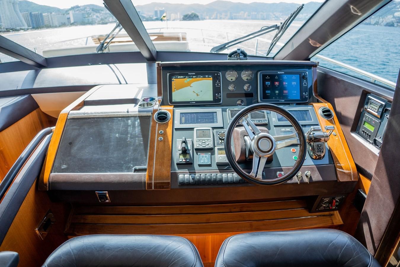 the inside of a car aboard PICHOS III Yacht for Sale