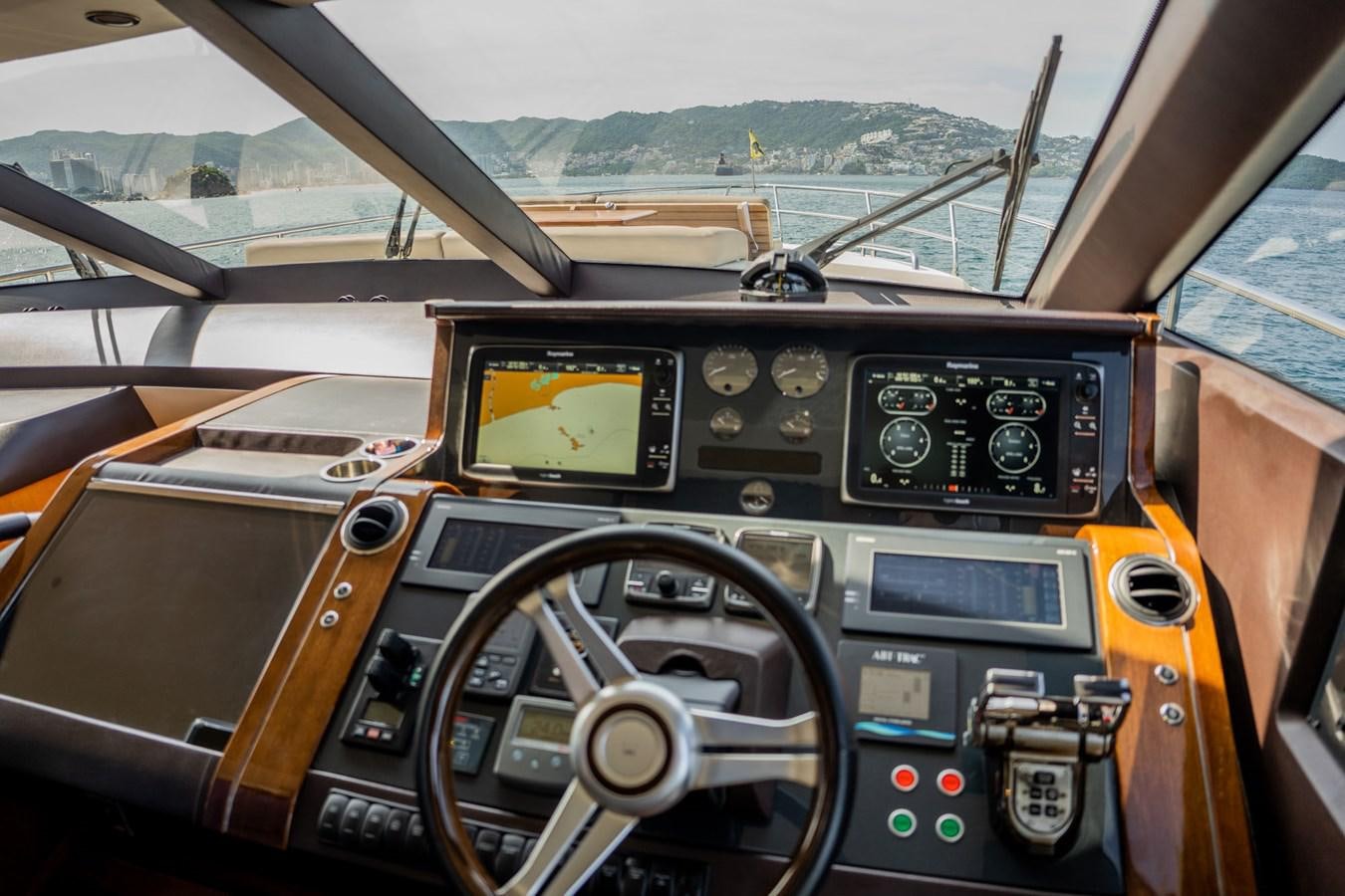 the inside of a cockpit aboard PICHOS III Yacht for Sale