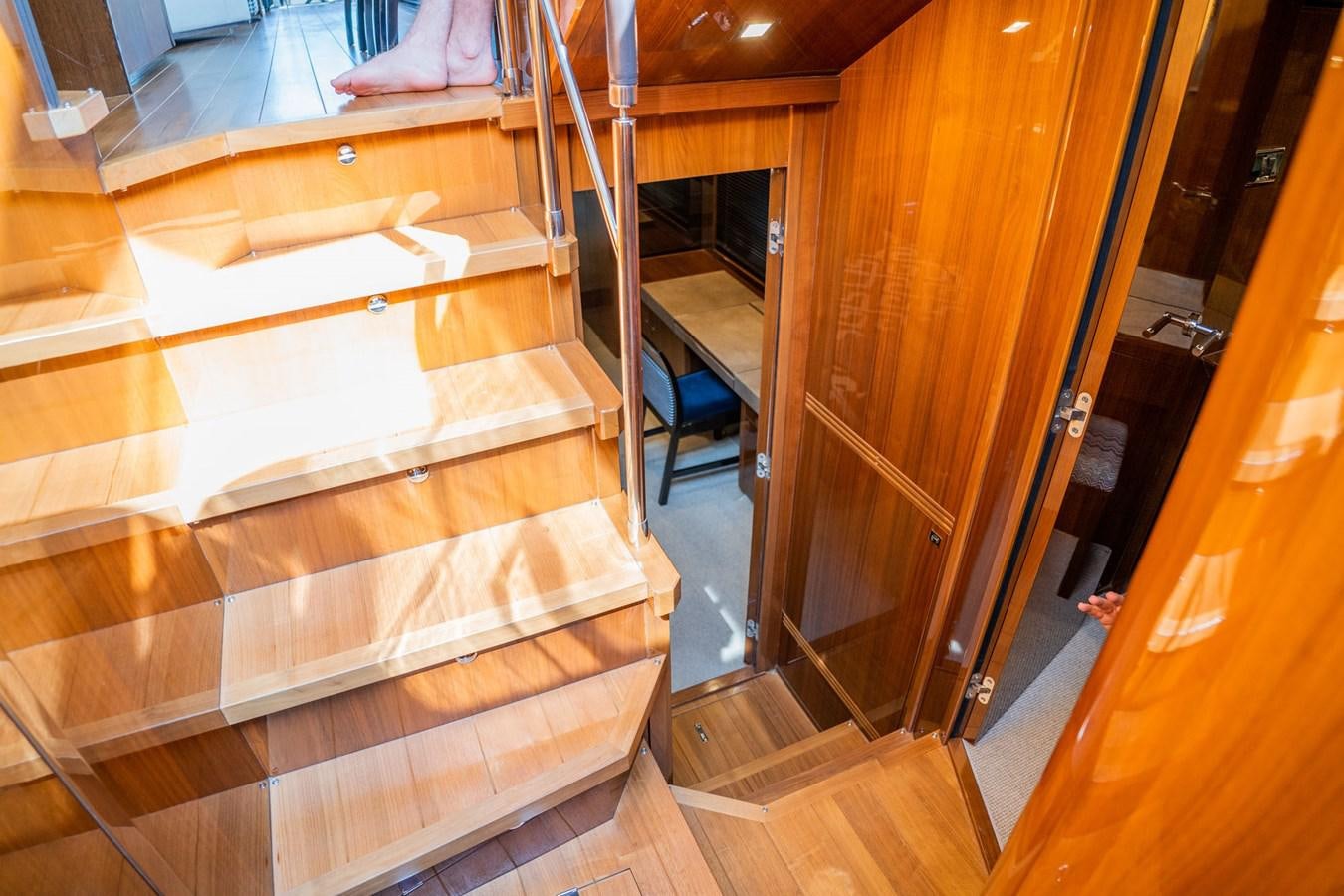 a set of stairs in a room aboard PICHOS III Yacht for Sale