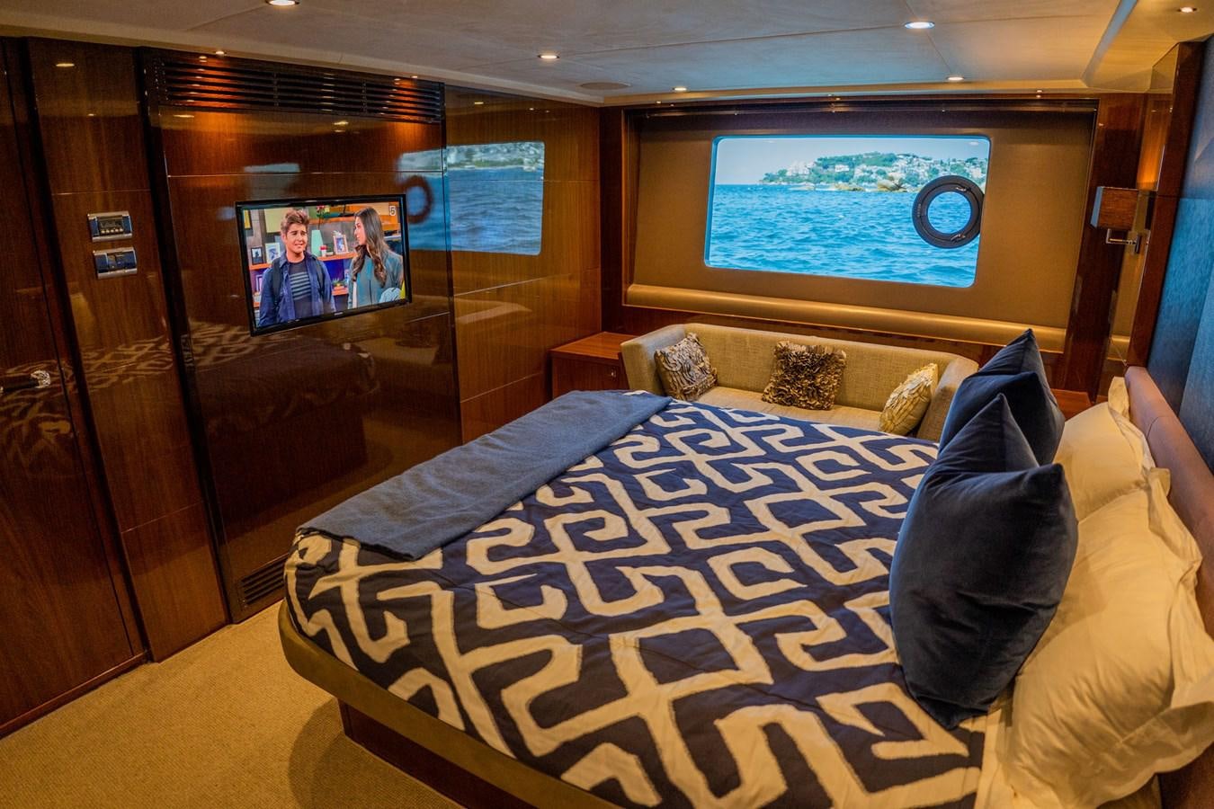 a bed with pillows aboard PICHOS III Yacht for Sale