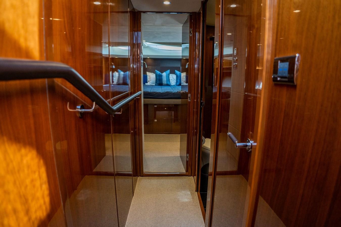 a door with glass doors aboard PICHOS III Yacht for Sale