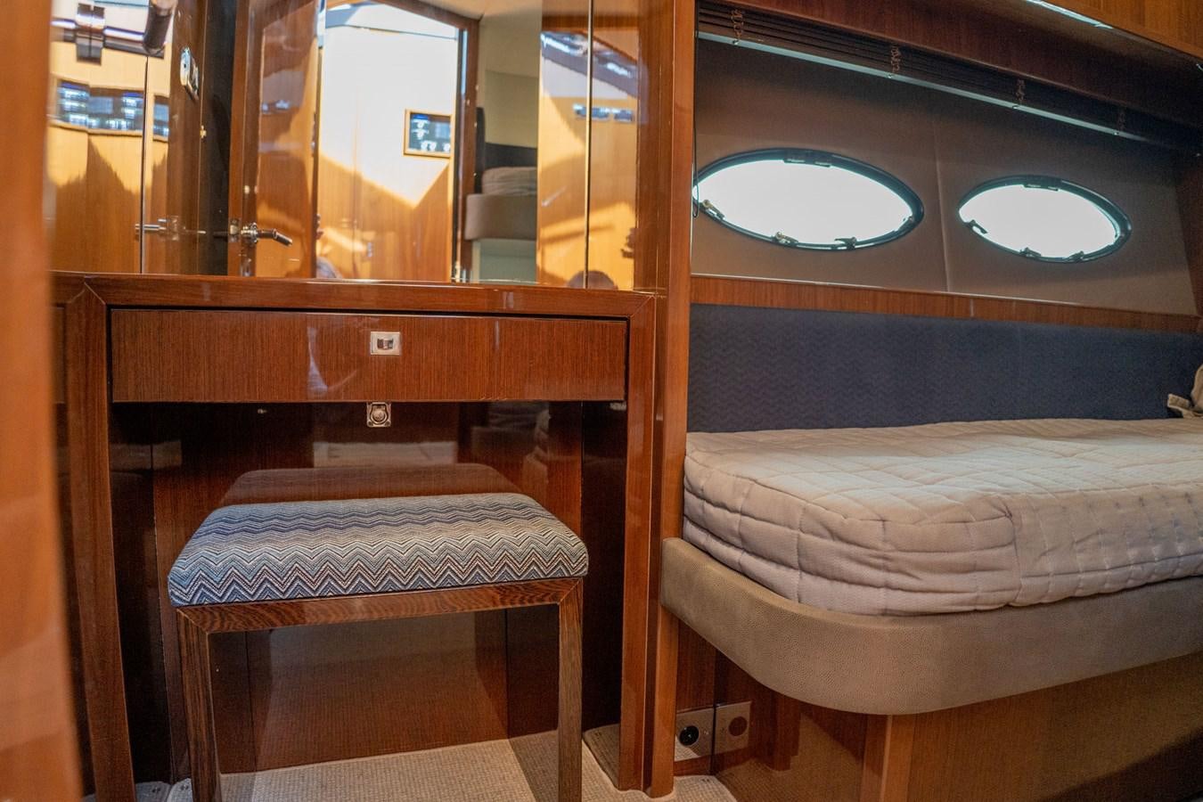 a couple of beds in a room aboard PICHOS III Yacht for Sale