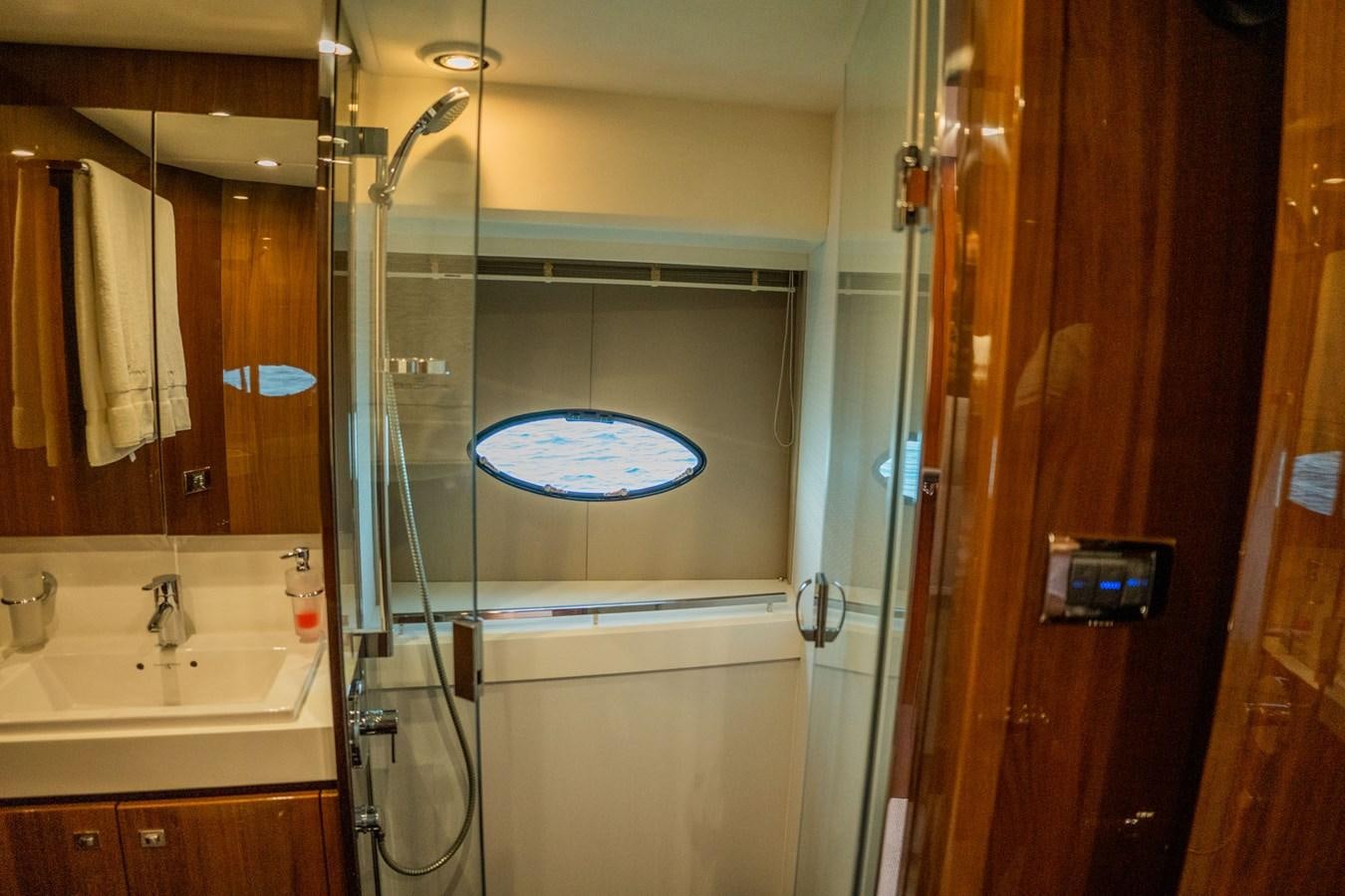 a shower unit in a bathroom aboard PICHOS III Yacht for Sale