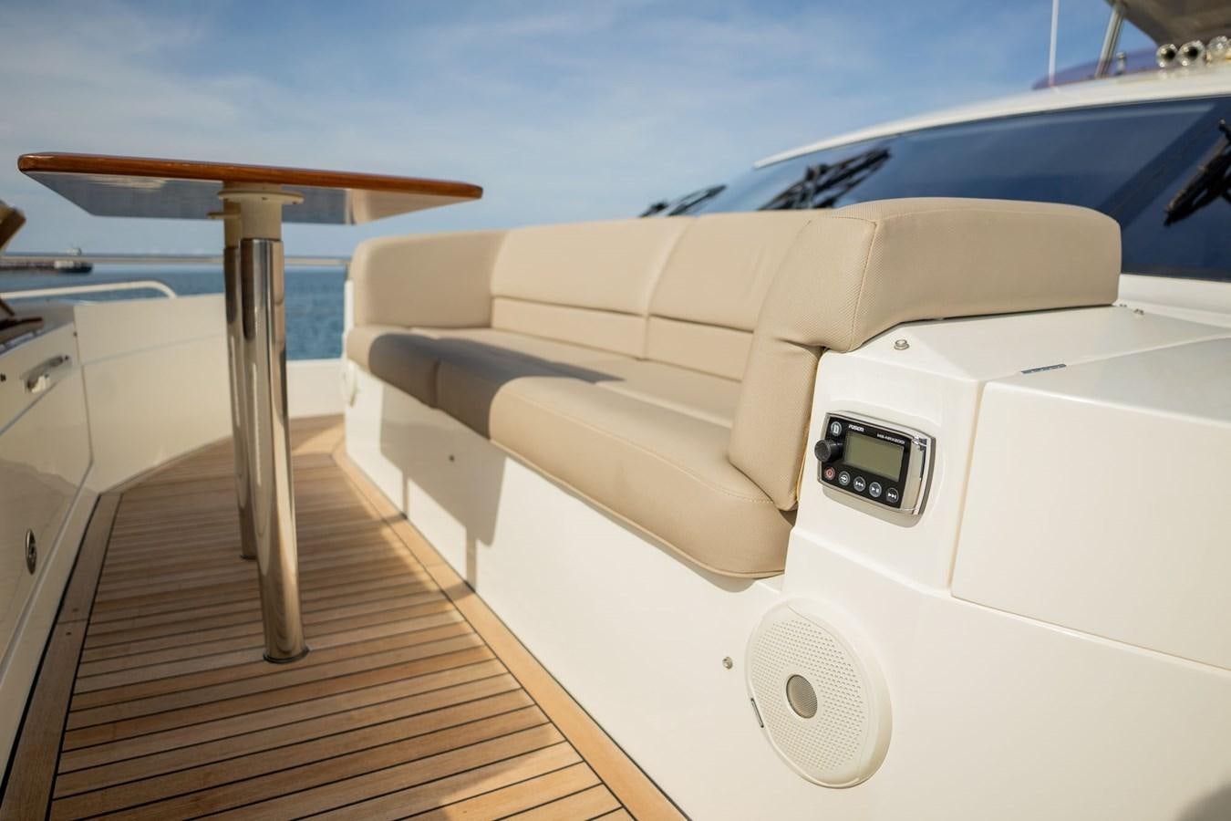 inside of a white car aboard PICHOS III Yacht for Sale